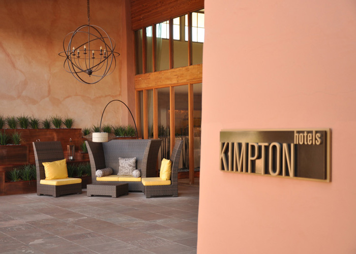 Kimpton Logo sign at entrance to Hotel. Sign is machined and painted aluminum.
