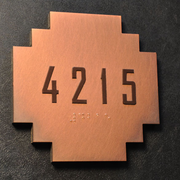 Final guestroom sign. Copper with oxidized finish, hand applied non directinal finish, and satin clearcoat.